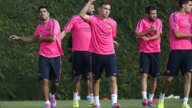 Luis Suarez training with his new Barcelona team mates