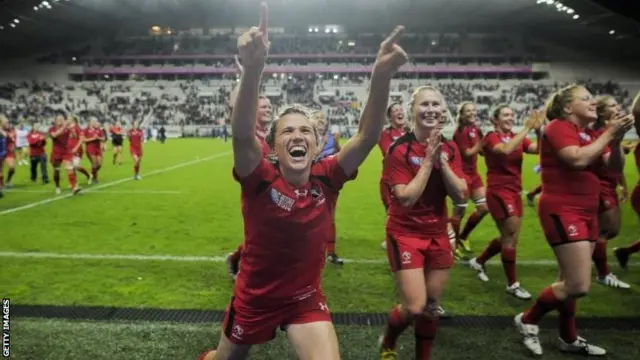 Canada celebrates their win over France