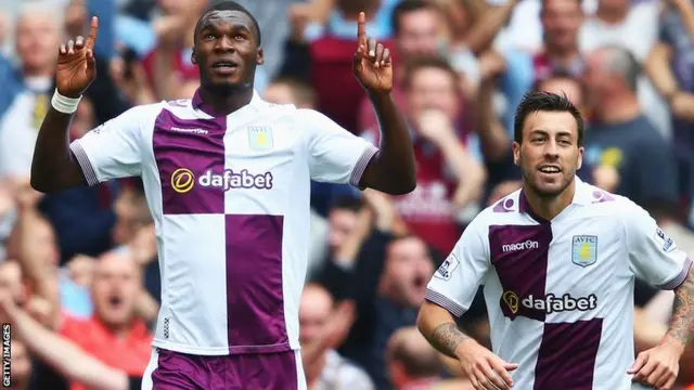 Christian Benteke celebrates scoring against Arsenal