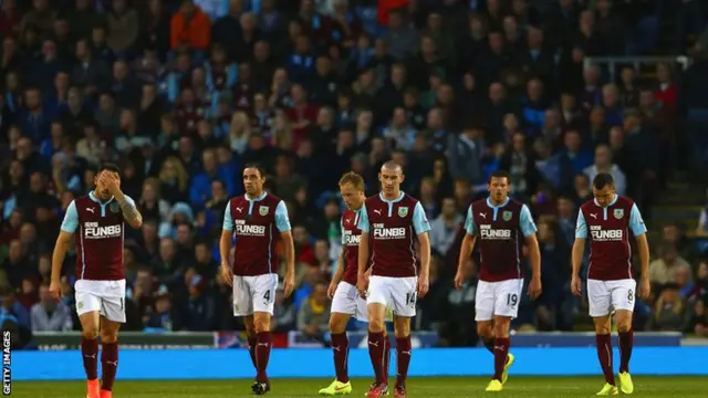 Burnley players react after conceding