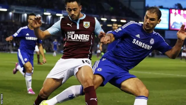 Danny Ings tussles with Branislav Ivanovic