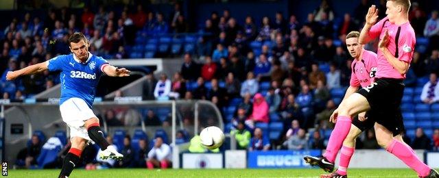 Lee McCulloch hammers in his team's fourth