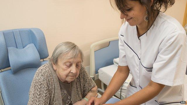 Picture of nurse caring for patient after stroke