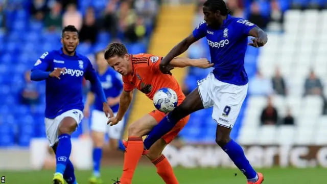 Birmingham City's Clayton Donaldson challenges Ipswich Town's Christophe Berra