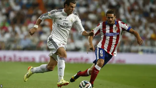 Gareth Bale forces Koke wide with the ball