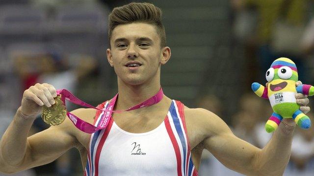 Giarnni Regini-Moran of Great Britain holds his gold medal after the Men's All-Around Artistic Gymnastics final of the Nanjing 2014 Youth Olympic Games