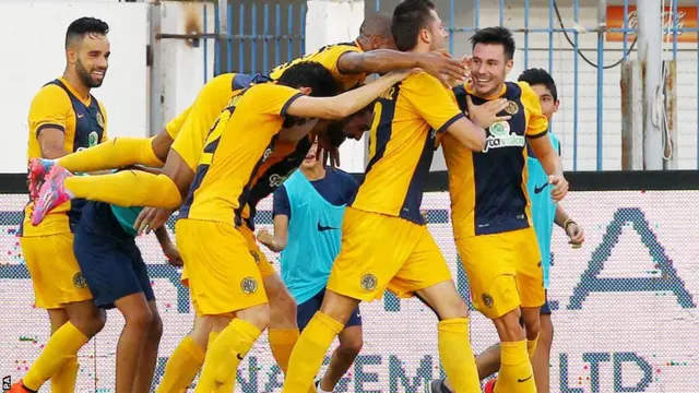 AEL's players celebrate a goal against Tottenham during the UEFA Europa League play off first leg