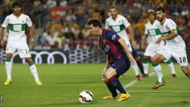 FC Barcelona's Lionel Messi controls the ball