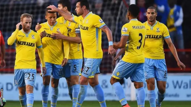 Dwight Gayle of Crystal Palace celebrates scoring his second goal