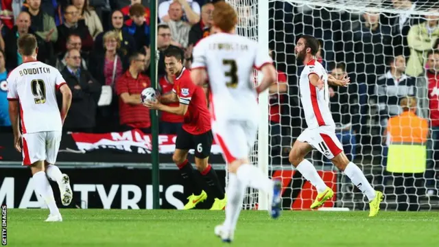 Will Grigg of Milton Keynes Dons celebrates