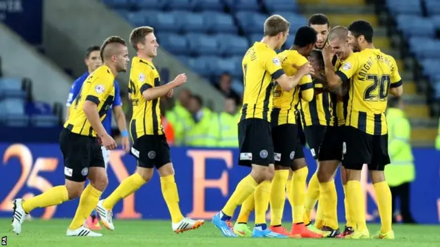 Shrewsbury Town's Andy Mangan centre celebrates