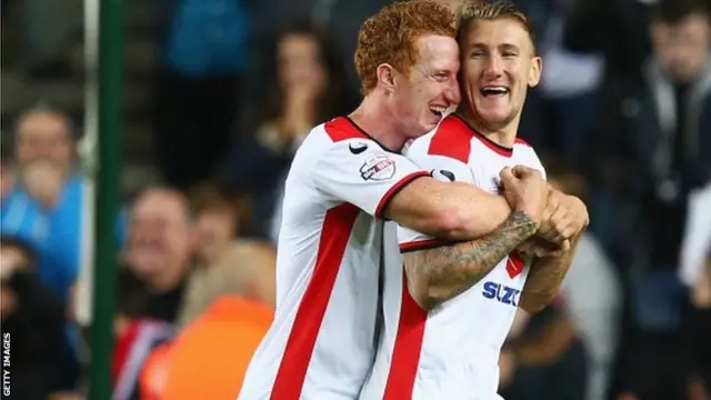 Dean Lewington of Milton Keynes Dons celebrates