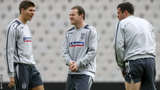 Steven Gerrard, Wayne Rooney and Jamie Carragher laugh