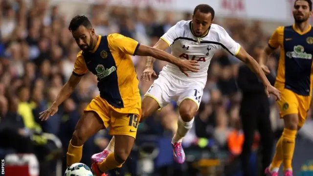 AEL Limassol's Edmar Lacerda da Silva (left) tussles with Tottenham's Andros Townsend