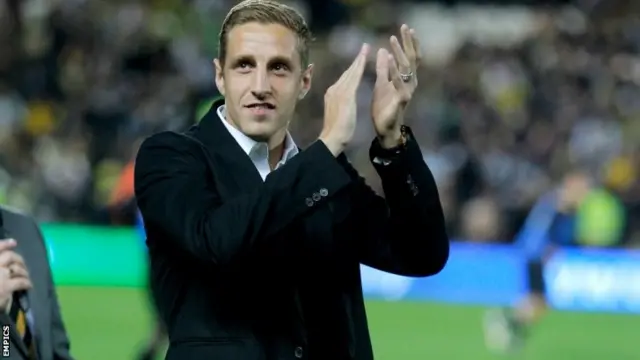 Michael Dawson greets the Hull fans