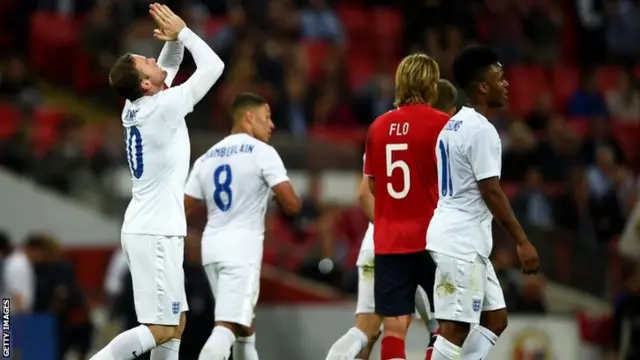 Wayne Rooney of England celebrates