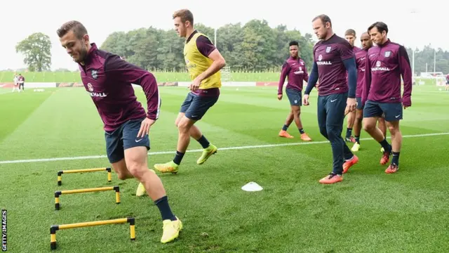 Jack Wilshere and Wayne Rooney