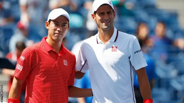 Kei Nishikori of Japan poses with Novak Djokovic of Serbia prior to their men's singles semi-final