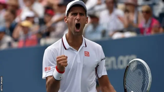 Novak Djokovic of Serbia celebrates a point against Kei Nishikori