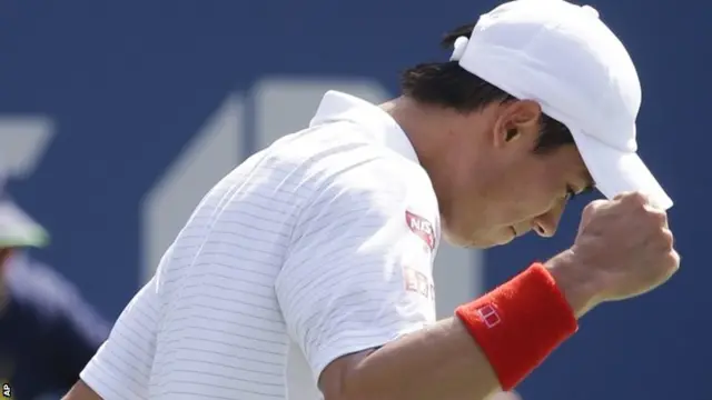 Kei Nishikori, of Japan, reacts after a shot against Novak Djokovic