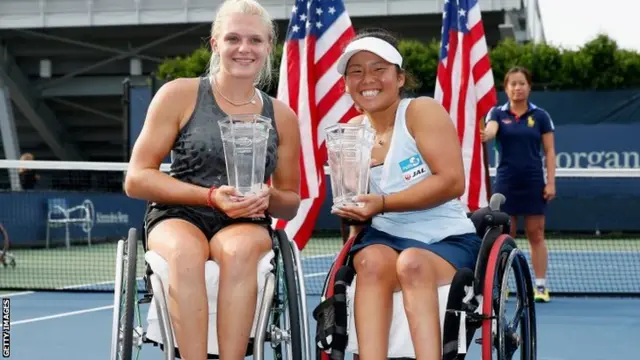 Jordanne Whiley of Great Britain and Yui Kamiji of Japan celebrate