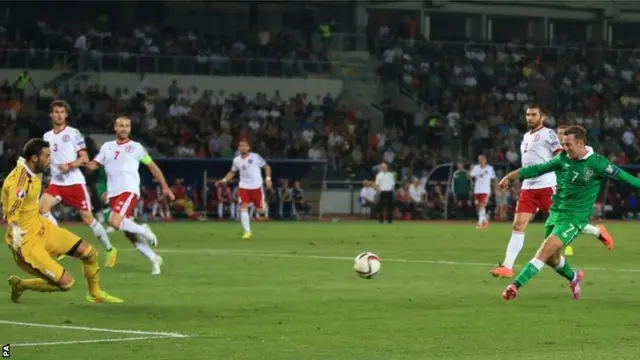 Republic of Ireland's Aiden McGeady scores opening goal