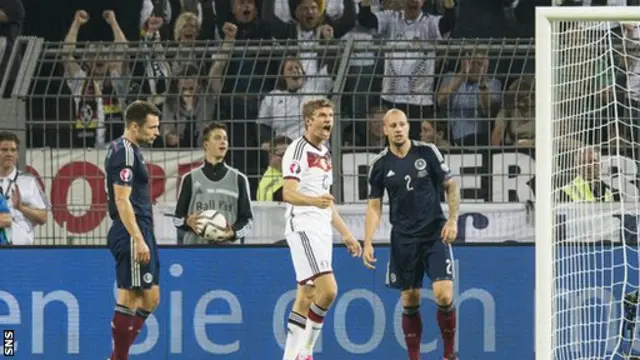 Thomas Muller celebrates giving Germany the lead