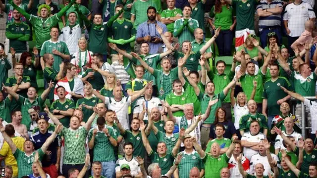 Supporters of Northern Ireland celebrate a goal