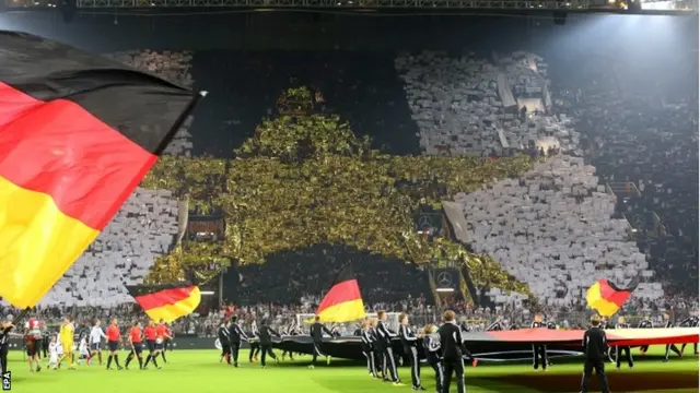 German fans perform a choreography