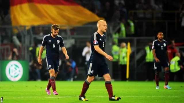 Scotland players leave the field