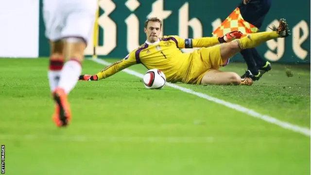 Goalkeeper Manuel Neuer of Germany savs a ball