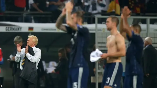 Gordon Strachan applauds the away fans