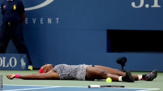 Serena Williams of the United States reacts after defeating Caroline Wozniacki