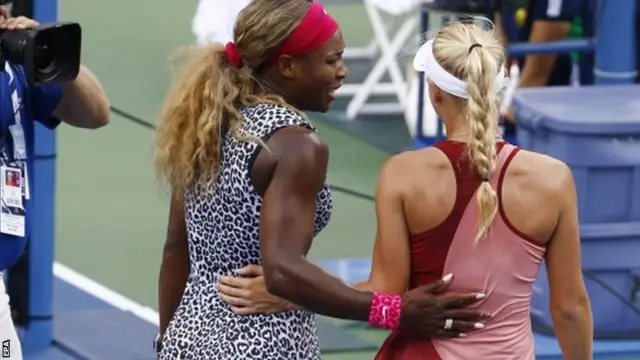 Serena Williams of the US and Caroline Wozniacki of Denmark embrace