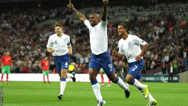 Jermain Defoe celebrates against Bulgaria in September 2010