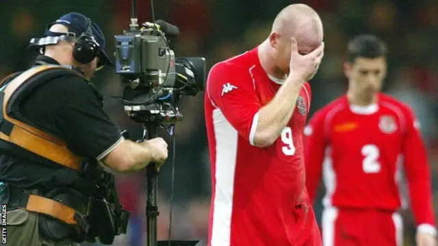 John Hartson after Wales are beaten by Russia in a play-off for Euro 2004