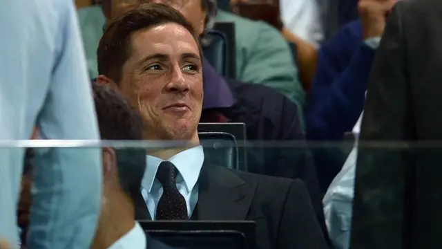 AC Milan striker Fernando Torres watches the Parma match from the stands