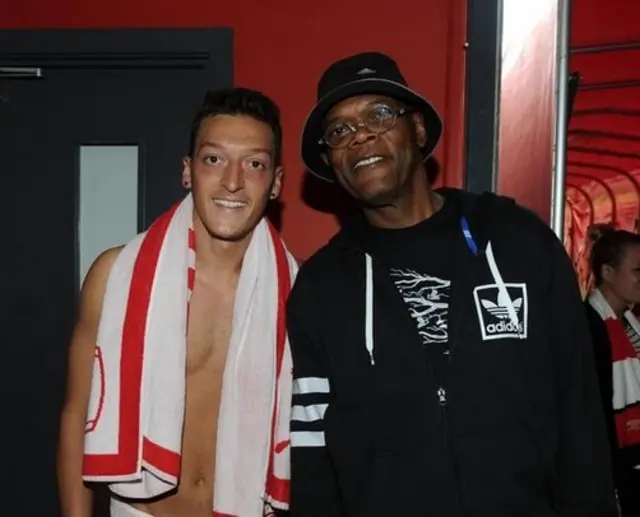 Mesut Ozil (left) with Samuel L Jackson