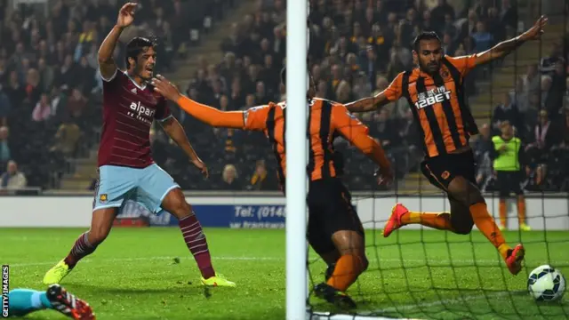 Hull's Curtis Davies turns it into his own net against West Ham