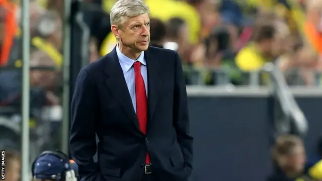 Arsene Wenger the manager of Arsenal looks on