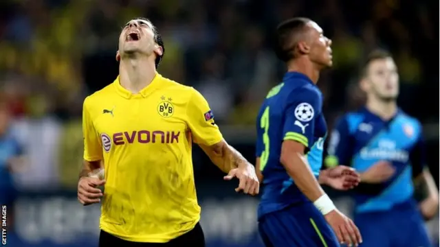 Henrikh Mkhitaryan of Borussia Dortmund reacts after a missed chance