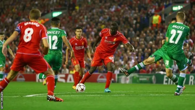 Mario Balotelli of Liverpool tries to find a way through