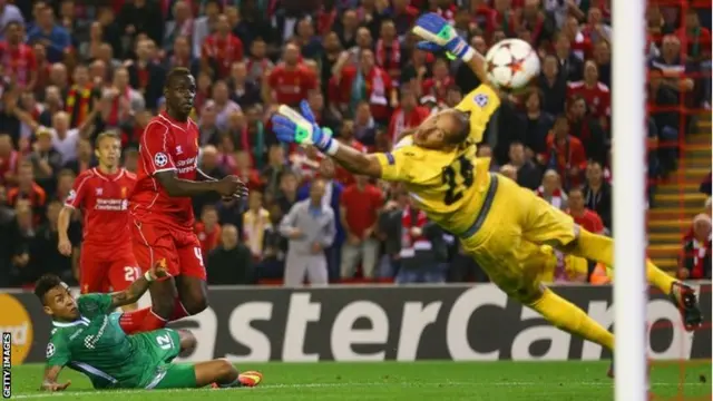 Mario Balotelli of Liverpool scores the opening goal