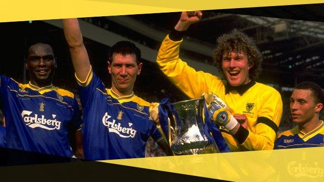 Wimbledon's Lawrie Sanchez and David Beasant lift the FA Cup