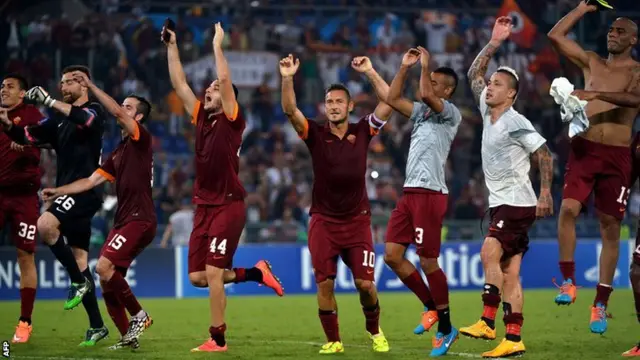 Roma celebrate their 5-1 Champions League win