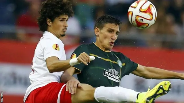 Salzburg's Andre Ramalho (left) challenges Celtic's Stefan Scepovic