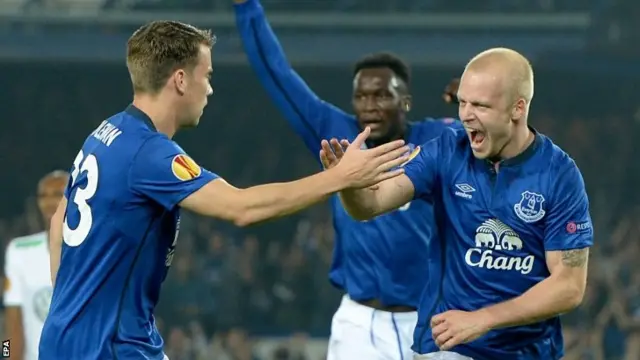 Everton celebrate scoring against Wolfsburg