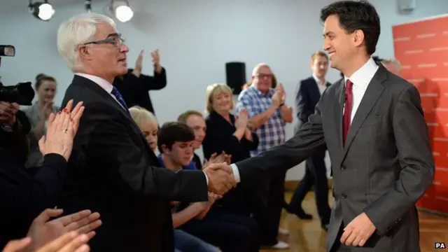 Better Together leader Alistair Darling is congratulated by Labour leader Ed Miliband at a rally in Glasgow