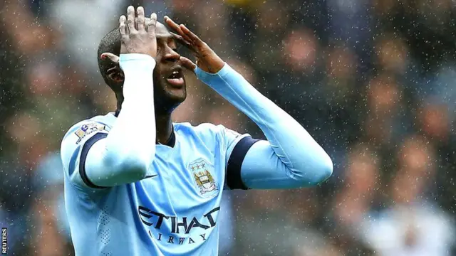 Yaya Toure, hands on head