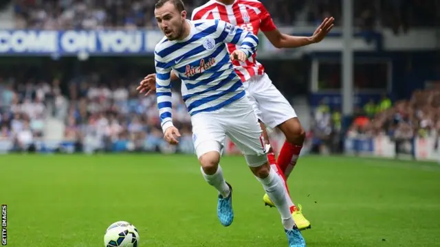 QPR's Jordon Mutch takes on Steven N'Zonzi